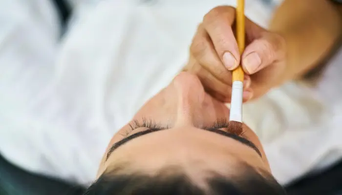 What are the best ways to brush your eyelash extensions after a shower?